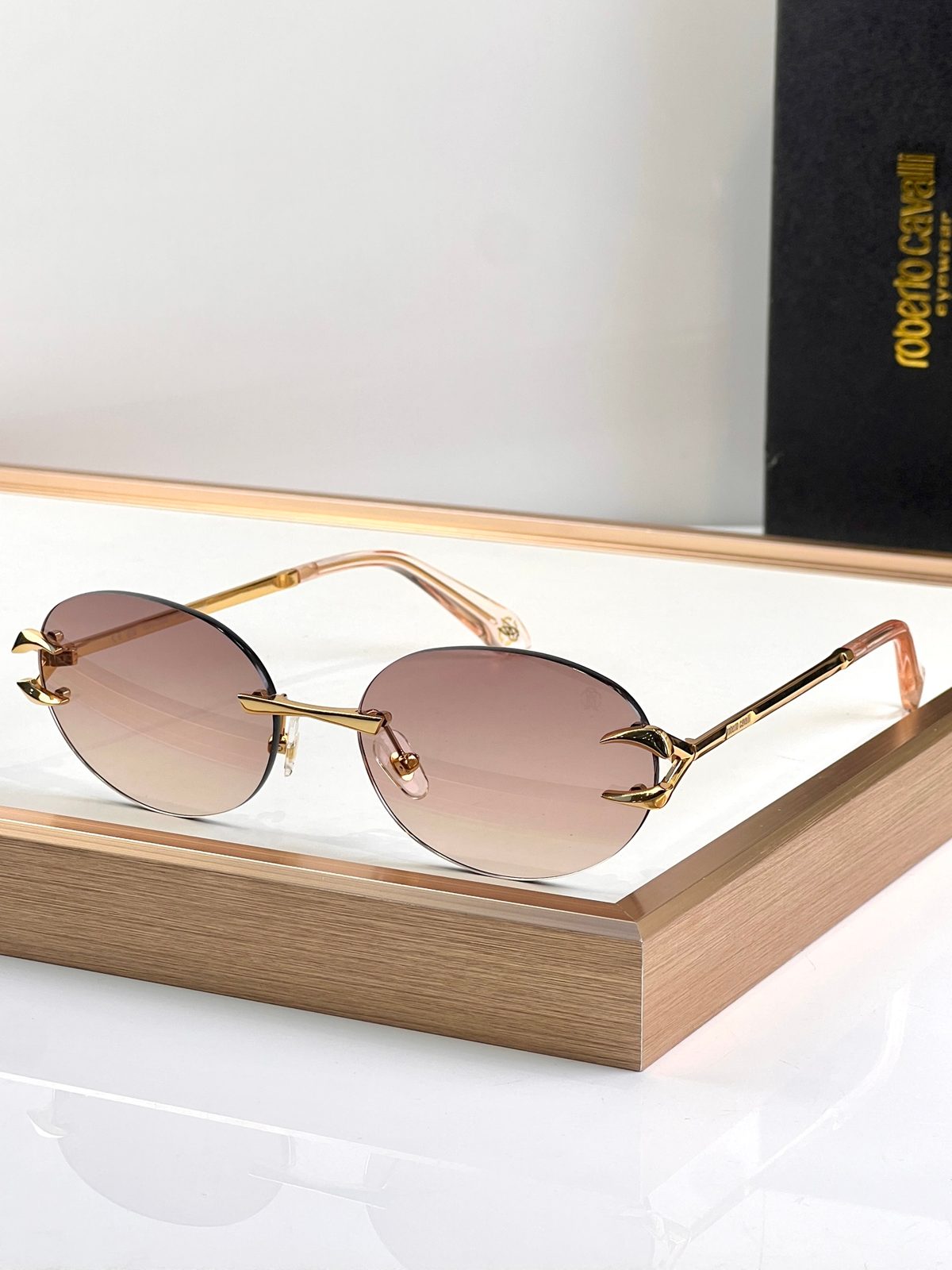 Roberto Cavalli Rimless Oval Sunglasses