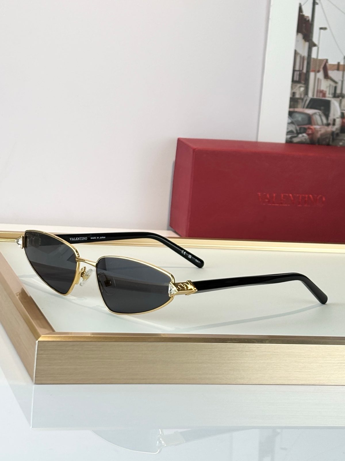 Valentino Gold and Black Oval Sunglasses