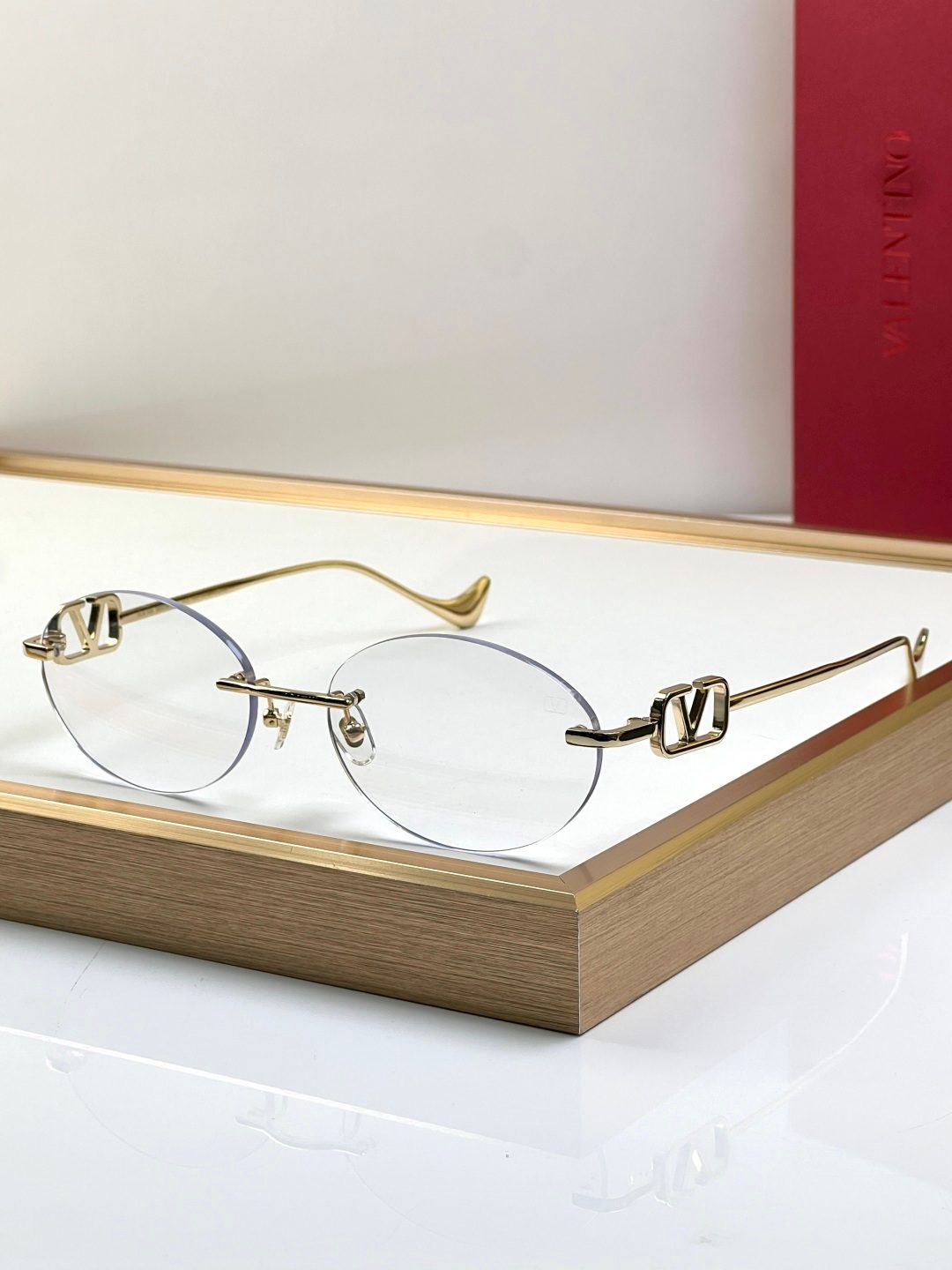 Valentino VLogo Rimless Oval Sunglasses