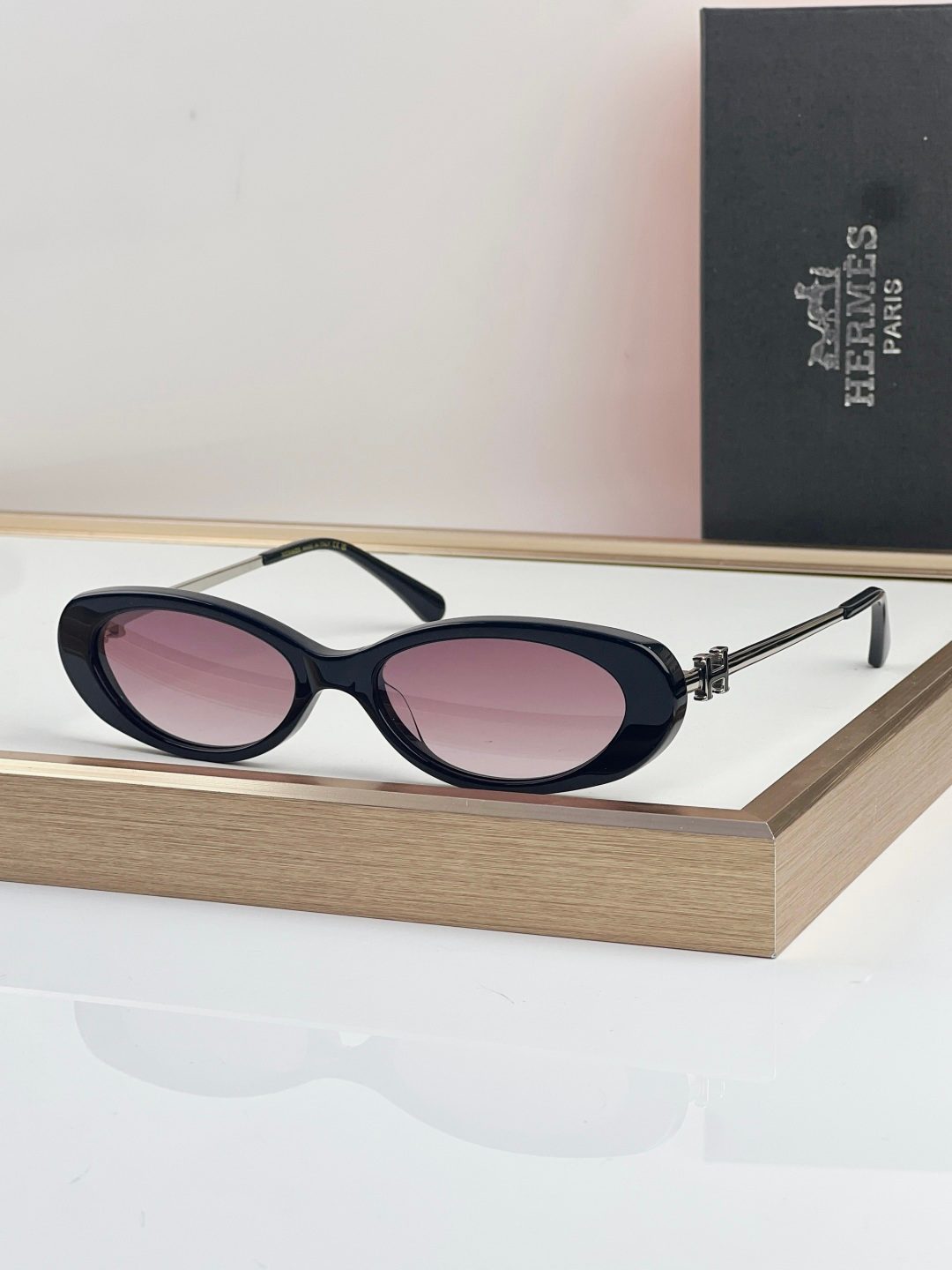 Hermès Black Oval Sunglasses