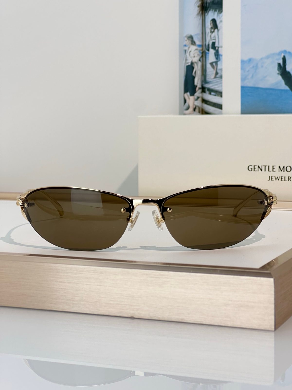 Gentle Monster Gold Oval Sunglasses