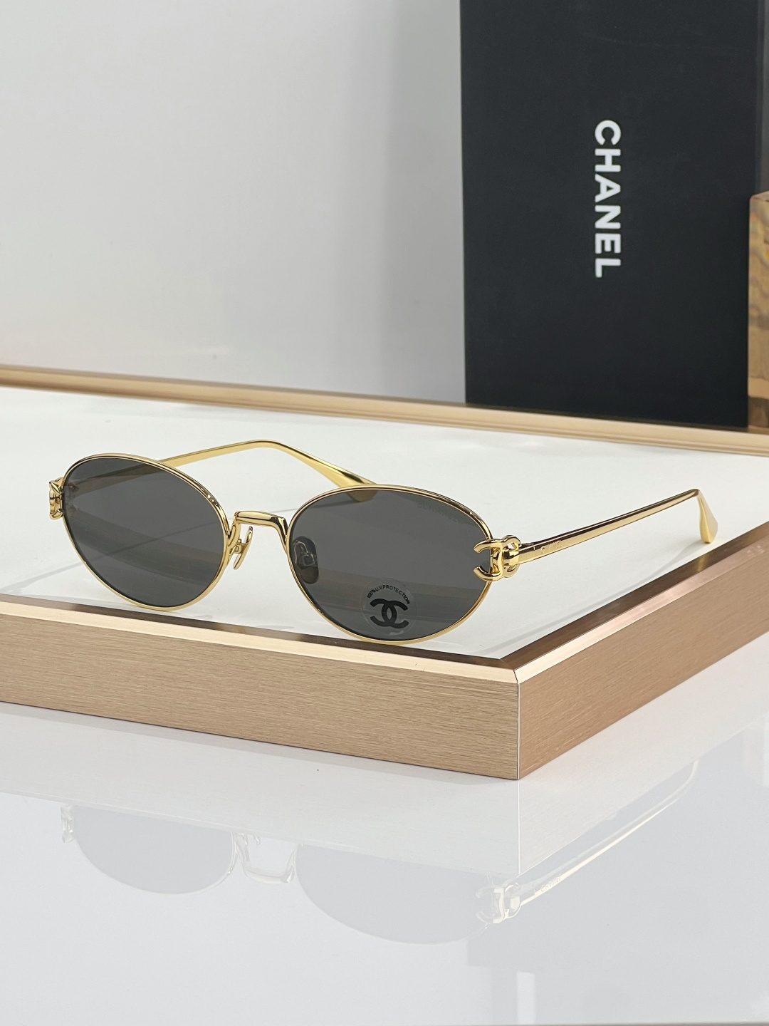 Chanel Gold Oval Sunglasses
