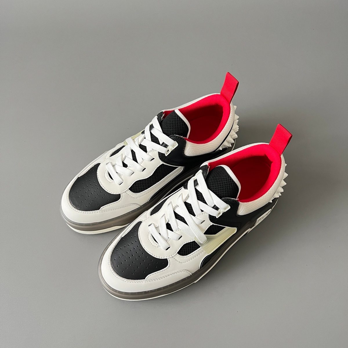 Nike Court Borough Low or similar Nike basketball-inspired sneaker with platform sole (exact model unclear from images)