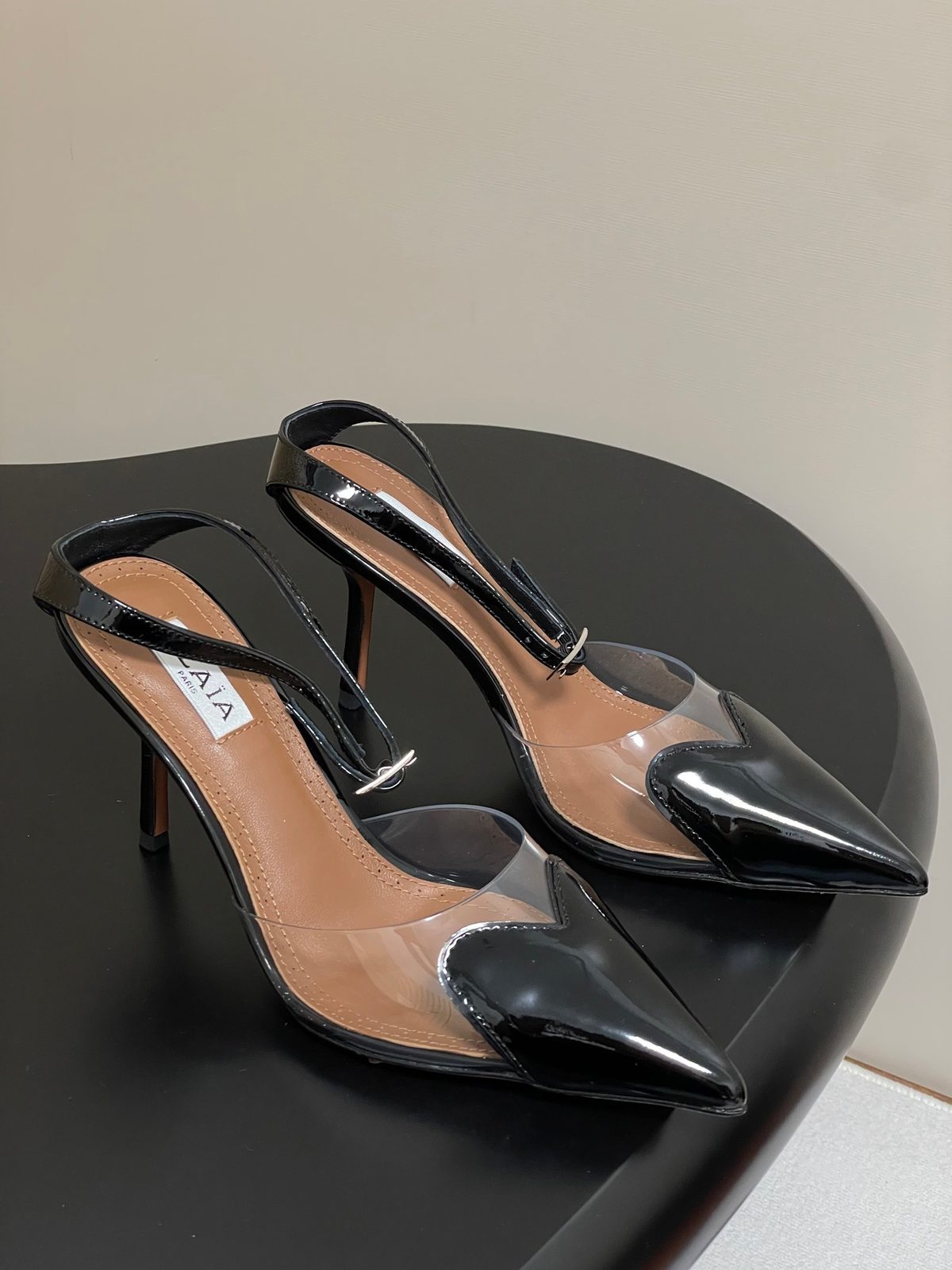 ALAÏA Black Patent Leather Slingback Heels