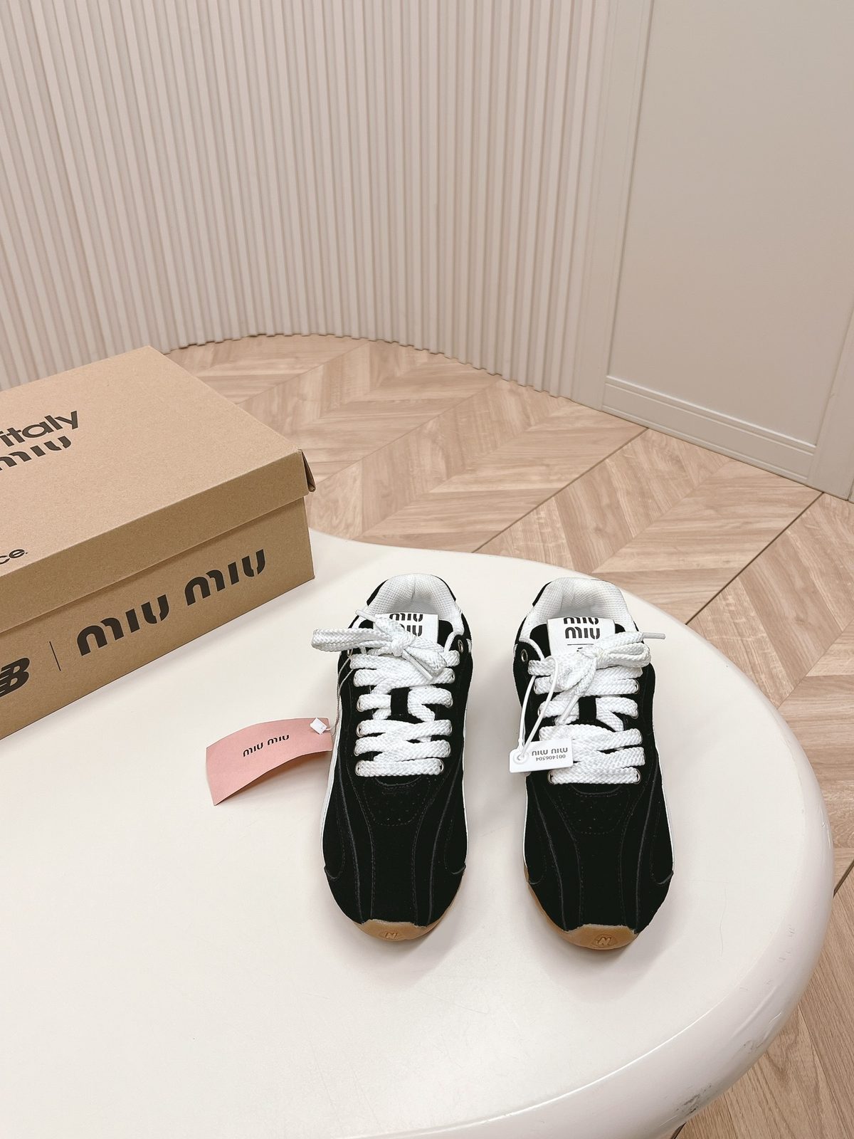 Miu Miu Black and White Suede Sneakers