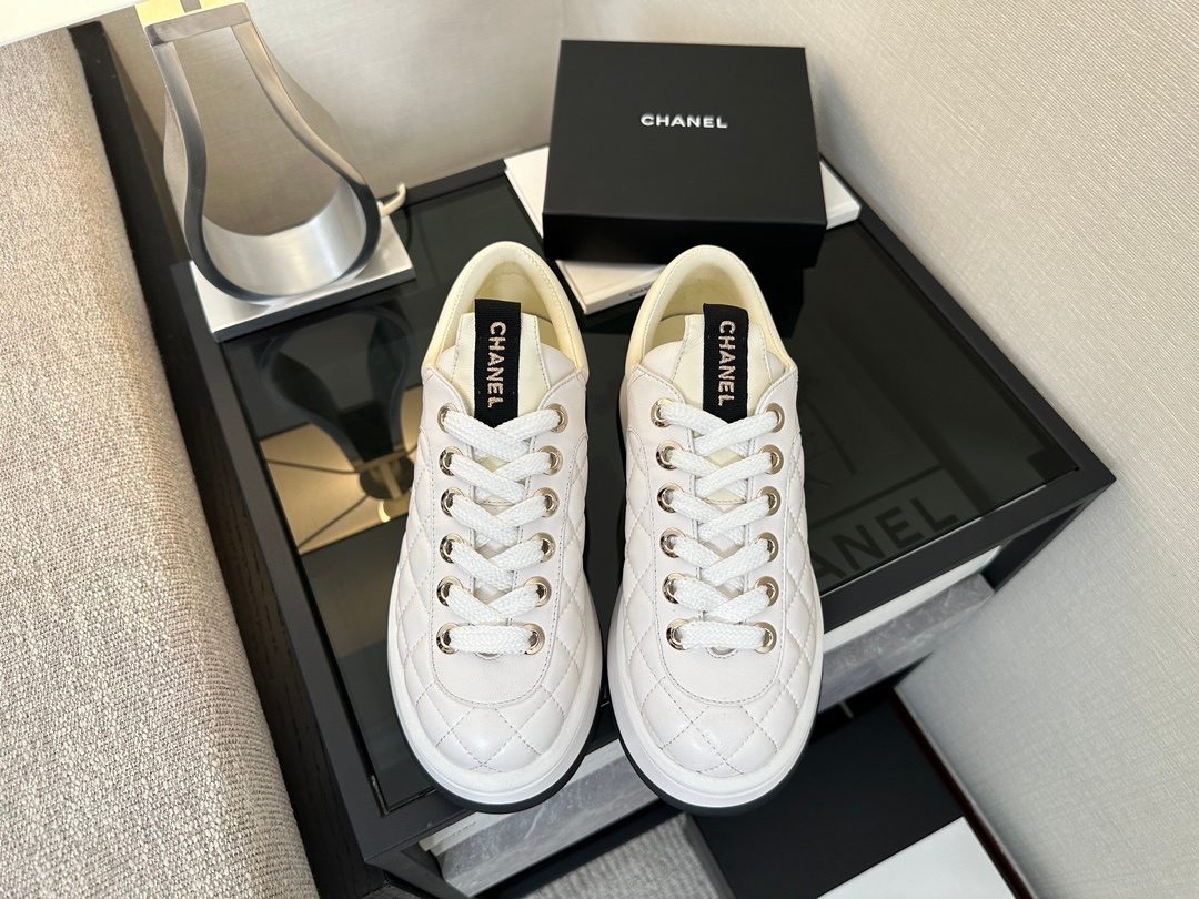 Chanel Quilted White Leather Sneakers