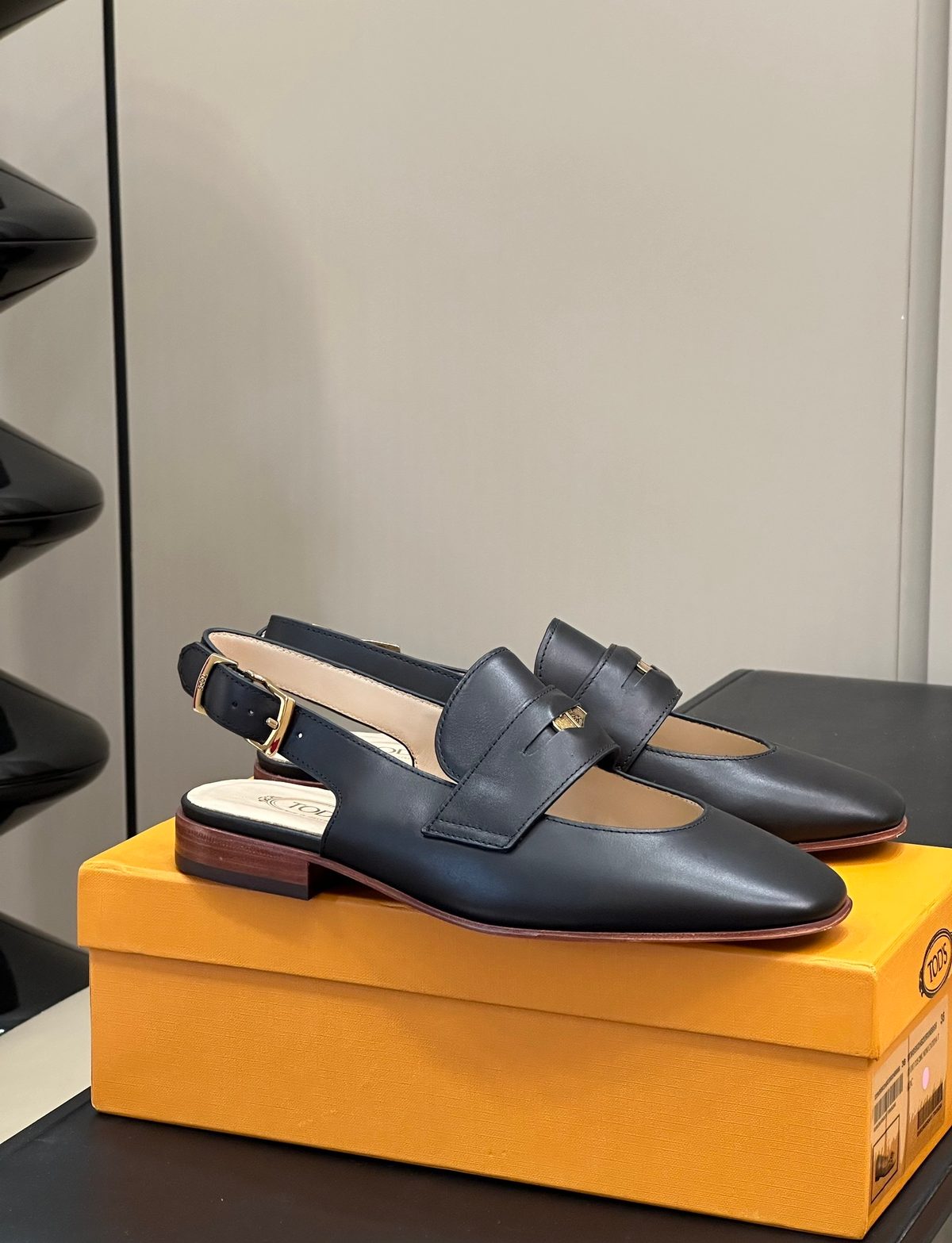 Tod's Black Leather Slingback Loafers