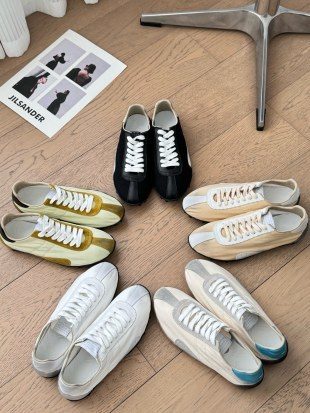 Luxury White Leather Sneakers with Black Sole