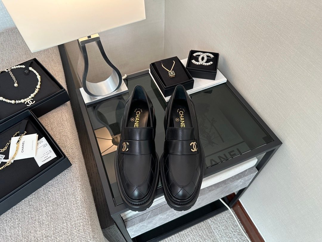 Chanel Black Quilted Loafers with Gold Hardware