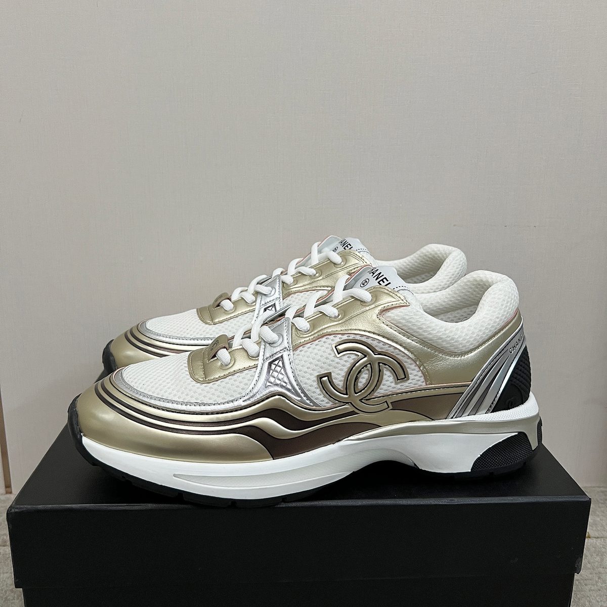Chanel CC Logo Leather Sneakers White Gold
