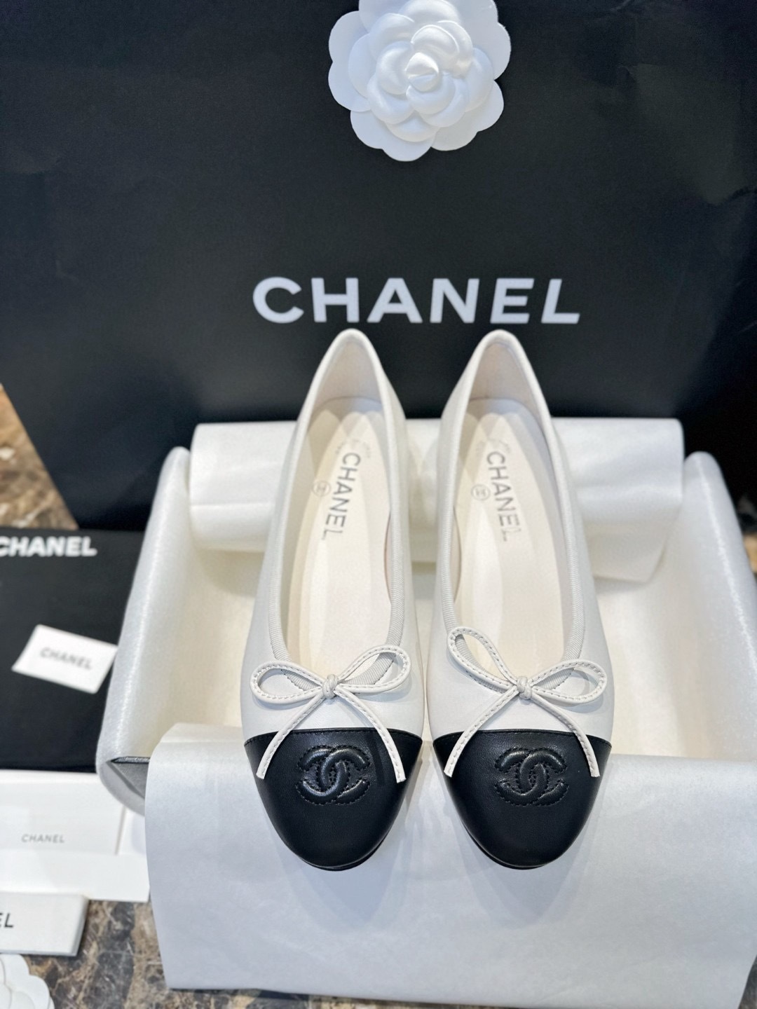 Chanel White and Black Leather Ballet Flats