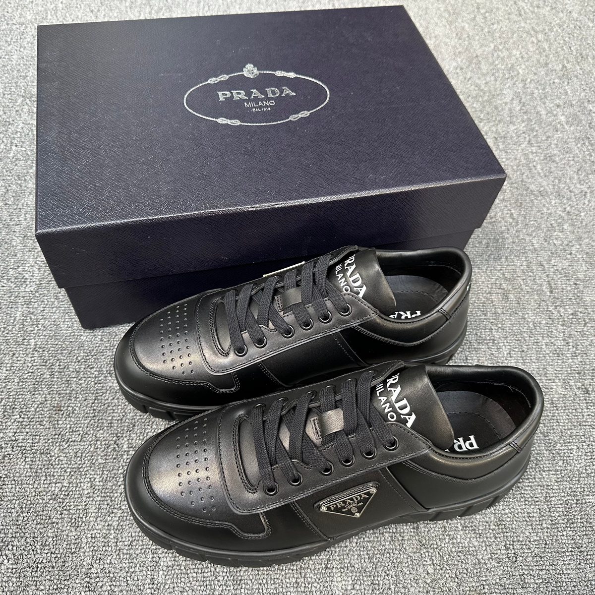 Prada Milano Perforated Leather Low-Top Sneakers