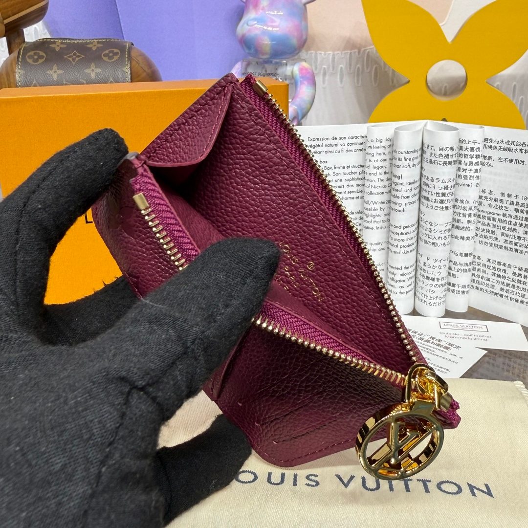 Louis Vuitton Monogram Empreinte Leather Wallet