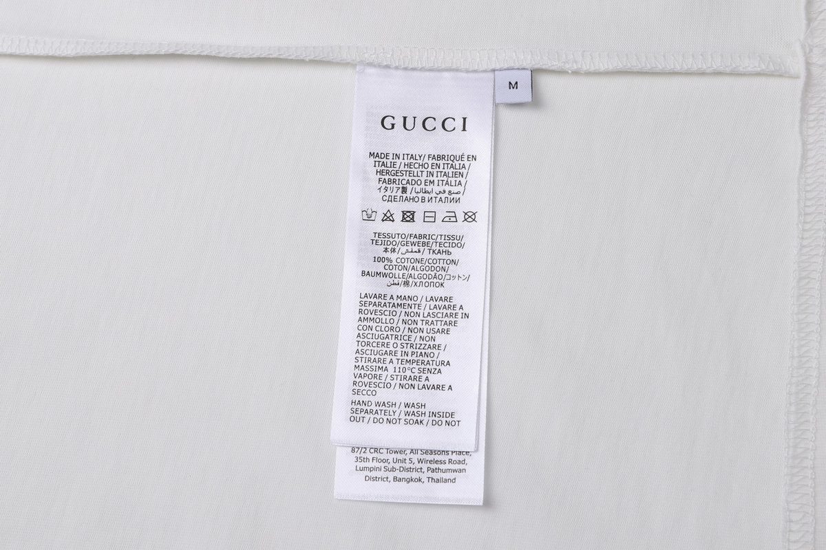 Gucci Circular Logo Embossed Cotton T-Shirt