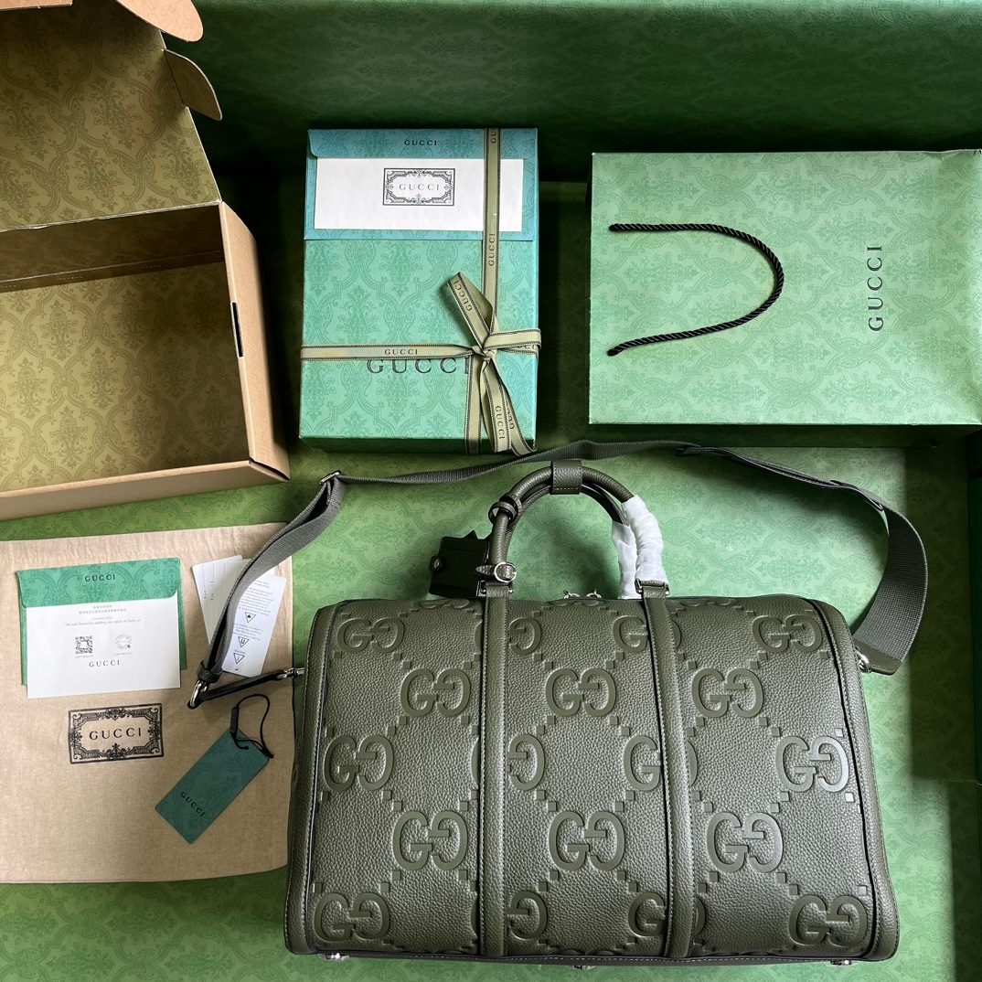 Gucci GG Embossed Leather Duffle Bag