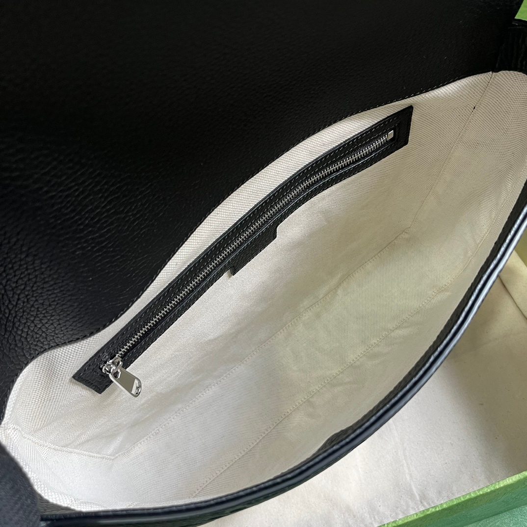 Gucci GG Embossed Leather Messenger Bag