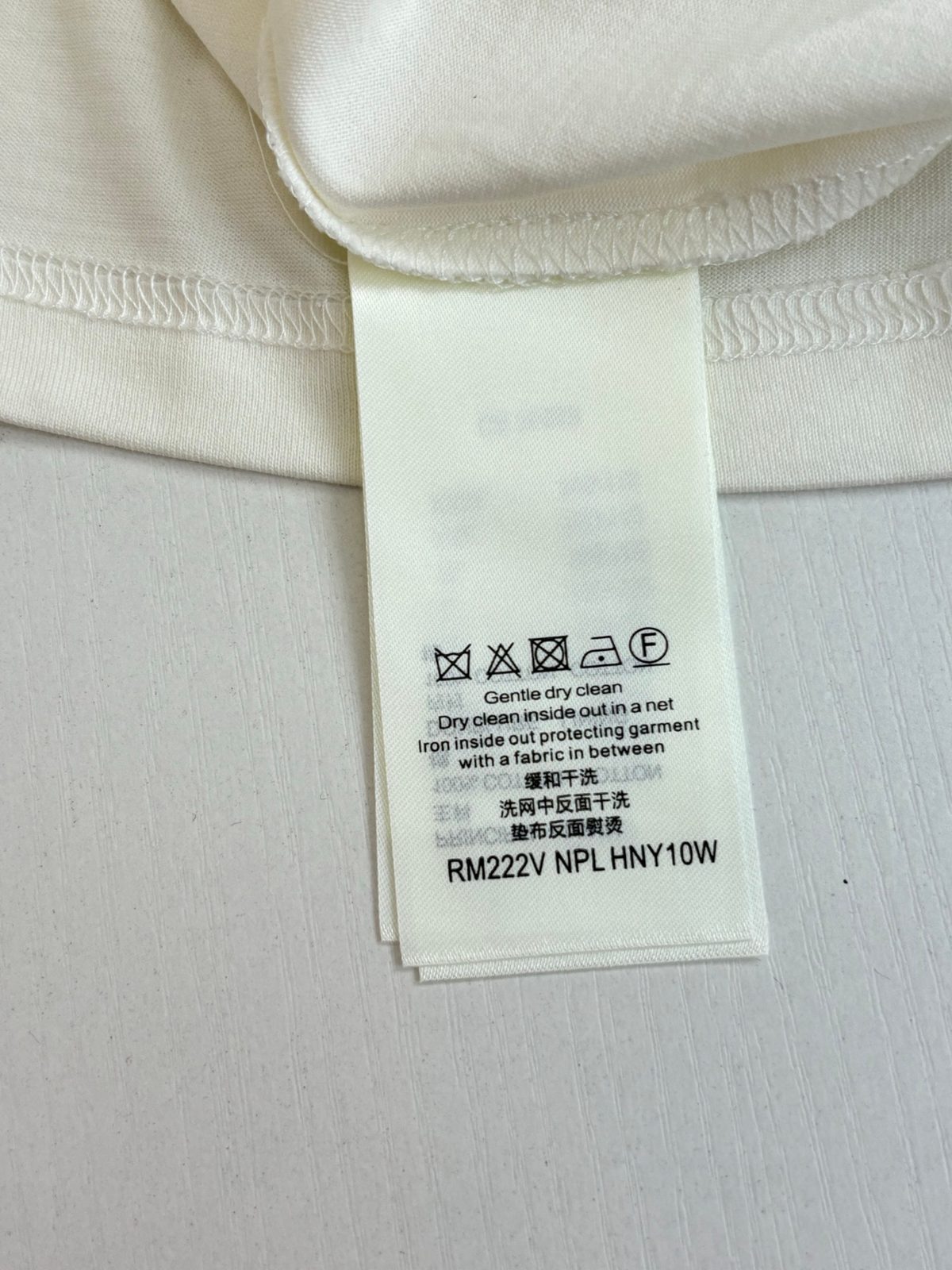 Unable to determine - care label only visible