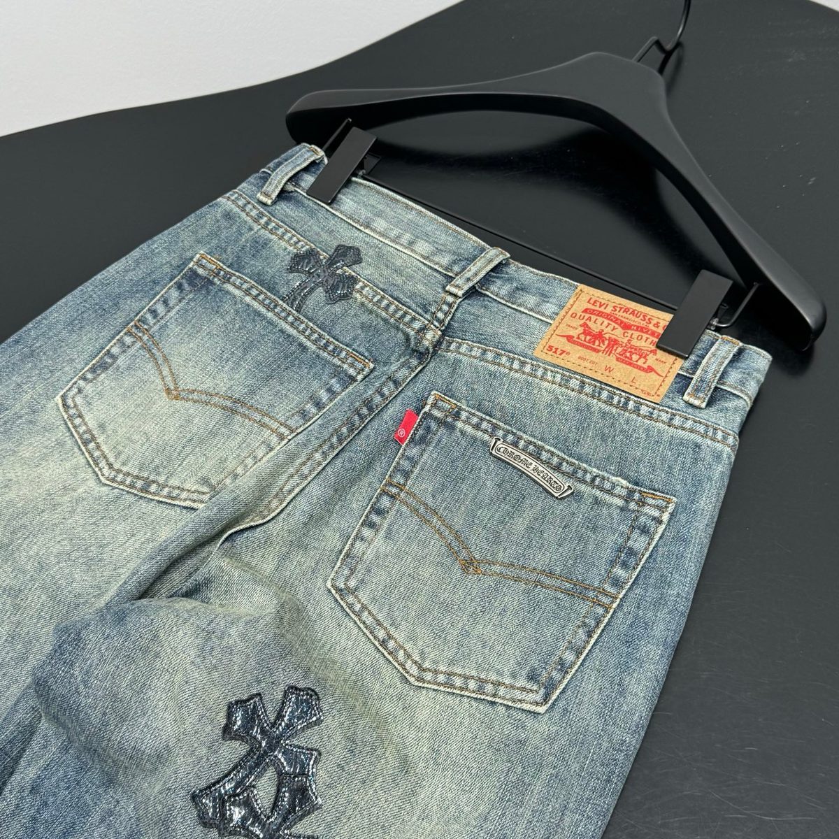 Levi's Distressed Denim Jeans with Cross Embroidery