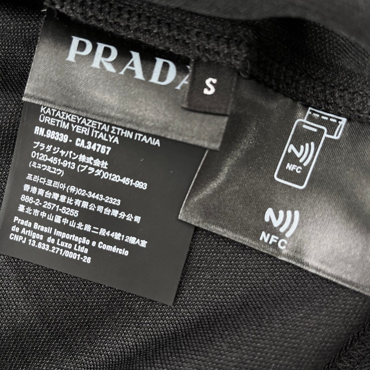 Prada Metal Badge Half-Zip Polo Shirt