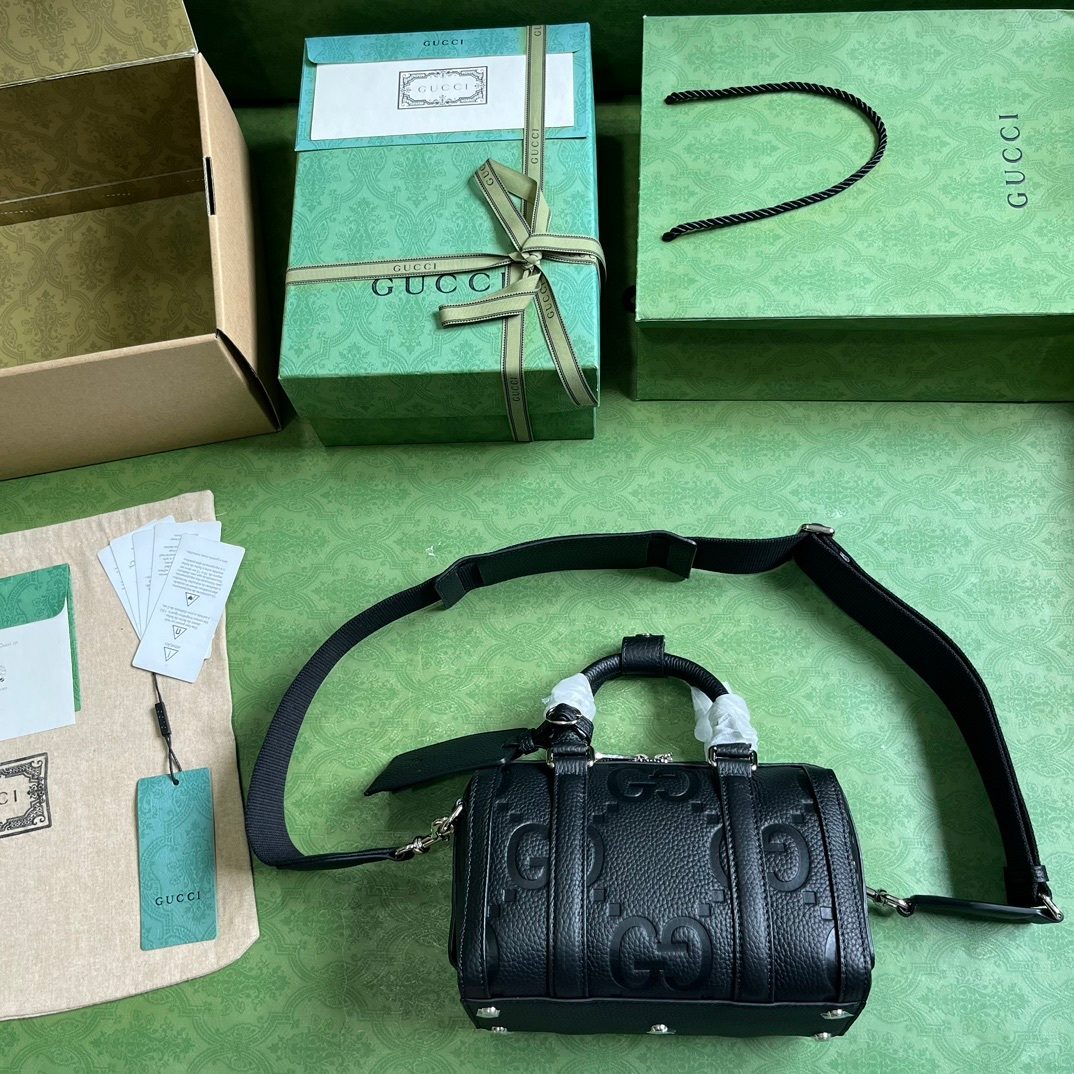 Gucci GG Embossed Black Leather Barrel Bag