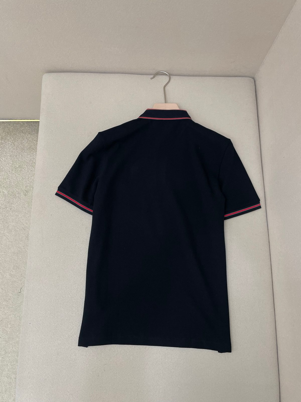 Navy Polo Shirt with Red Stripe Trim