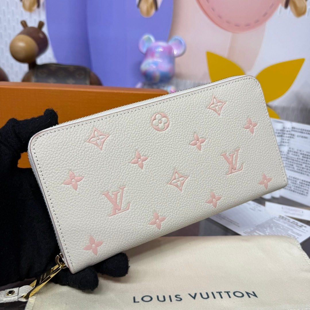 Louis Vuitton Monogram Embossed Zip Wallet Cream