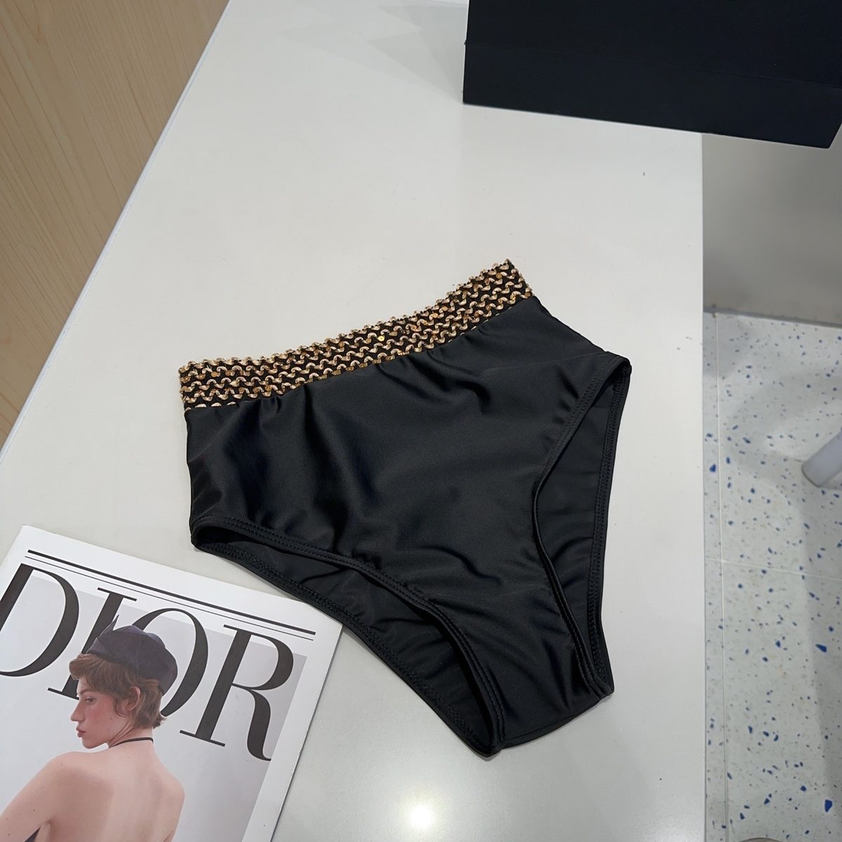 Black Swimsuit with Gold Chain Detail