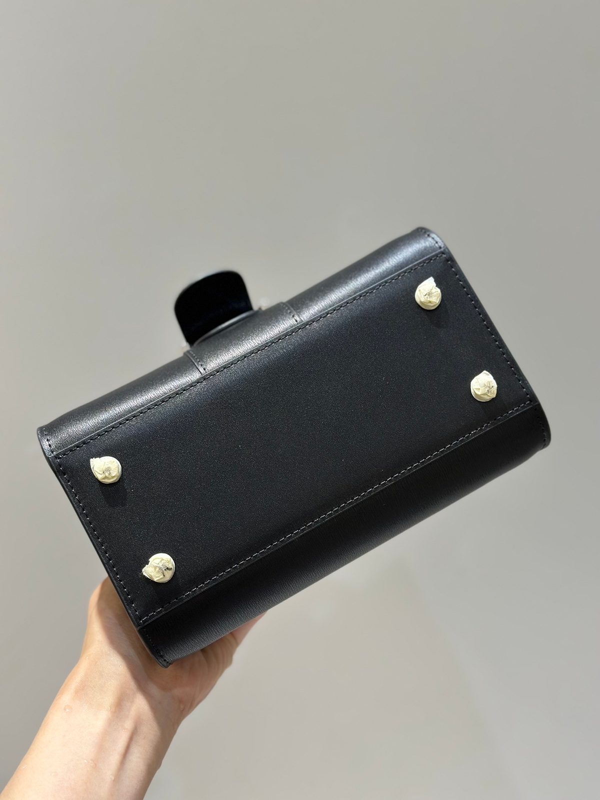 Delvaux Black Leather Wallet with Gold Hardware