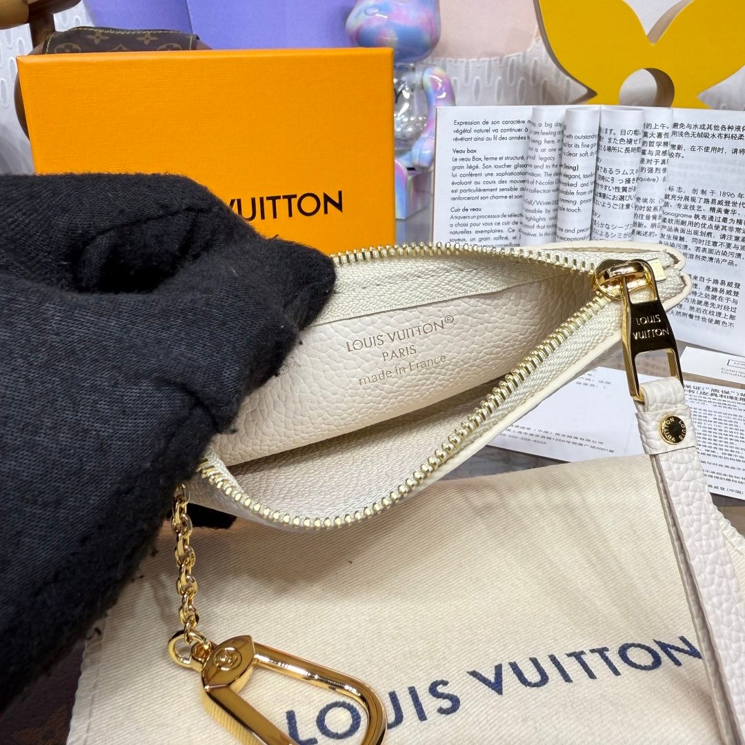 Louis Vuitton Monogram Canvas Pochette Wristlet