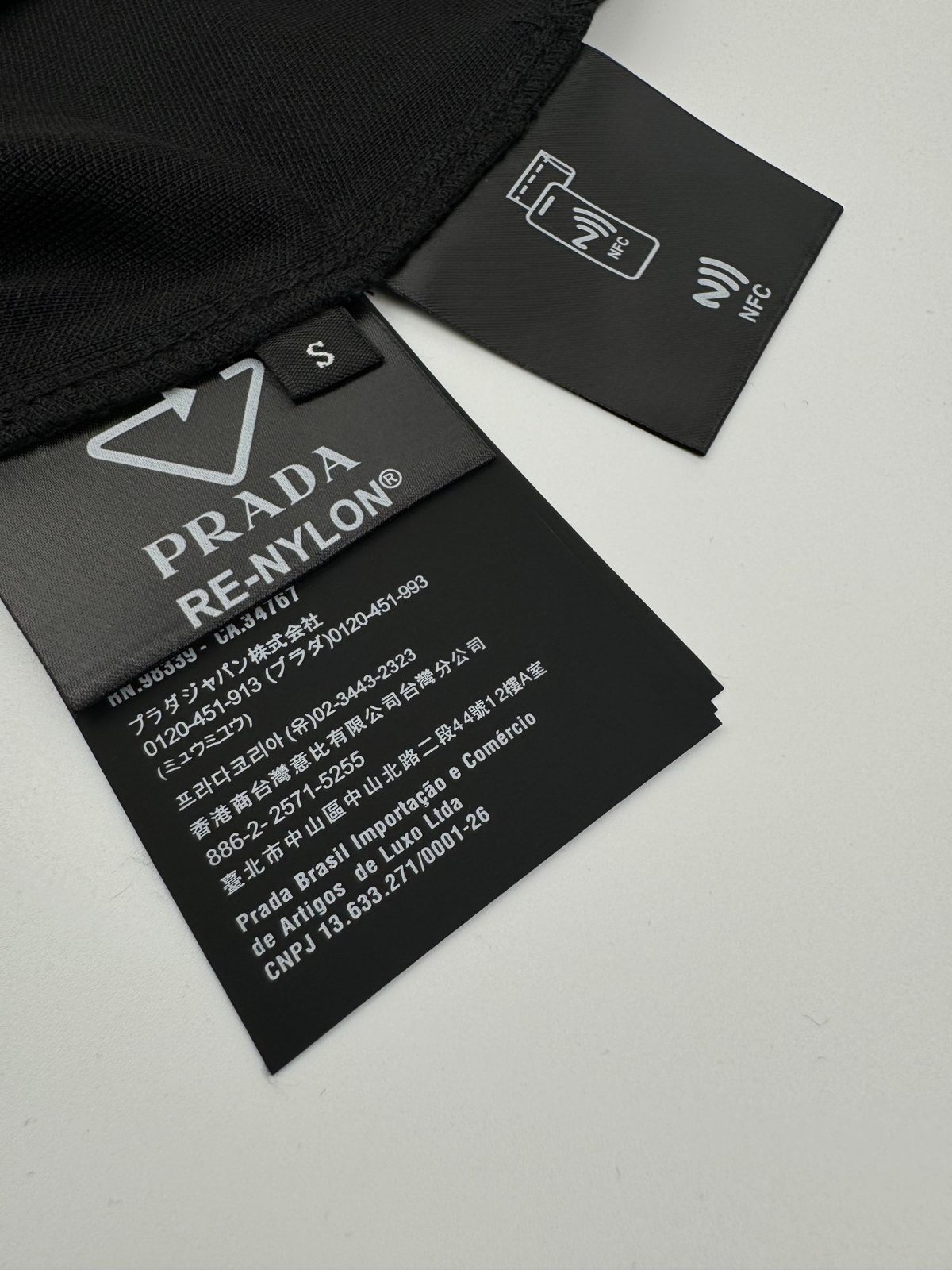 Prada Re-Nylon Triangle Logo Polo Shirt