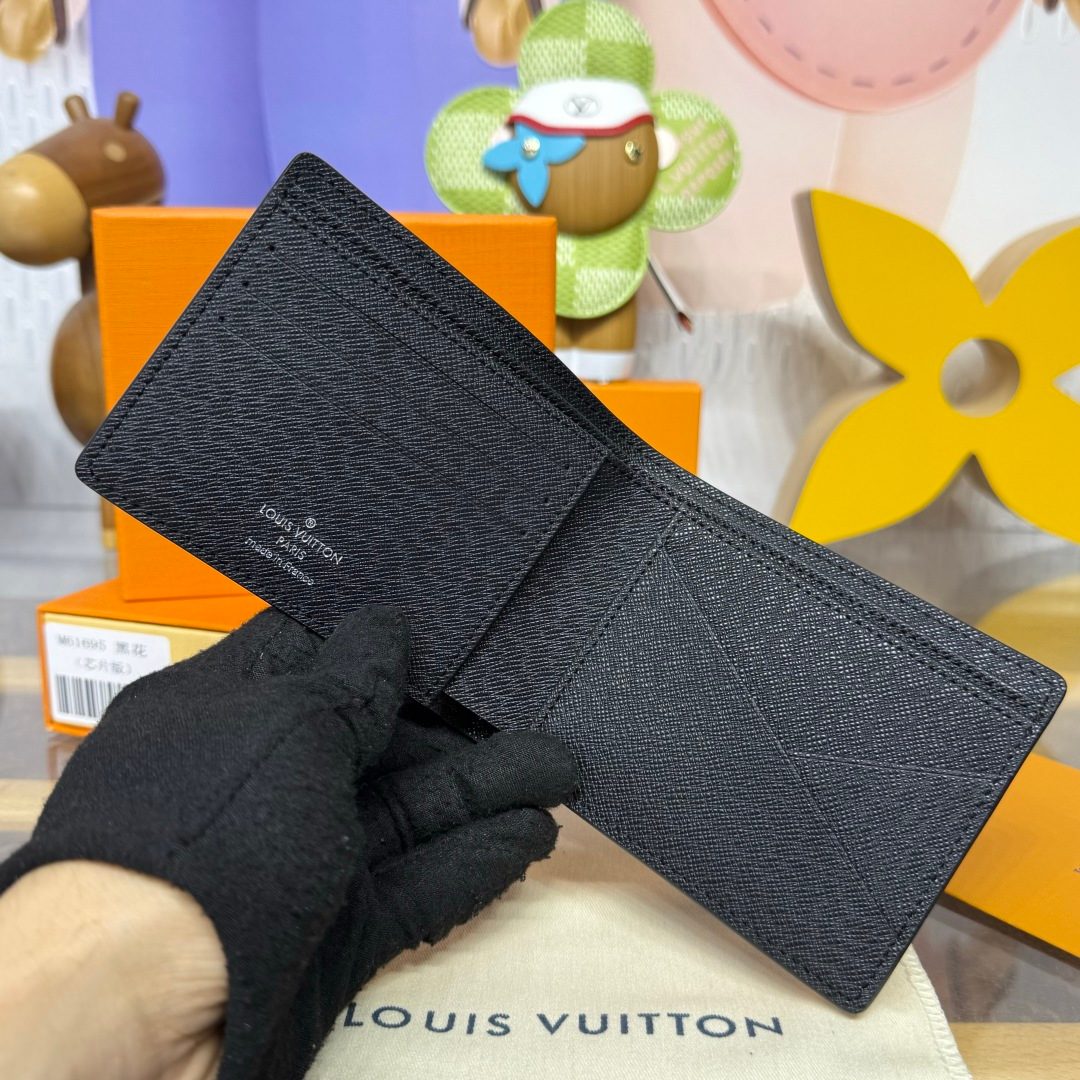 Louis Vuitton Taiga Leather Bifold Wallet