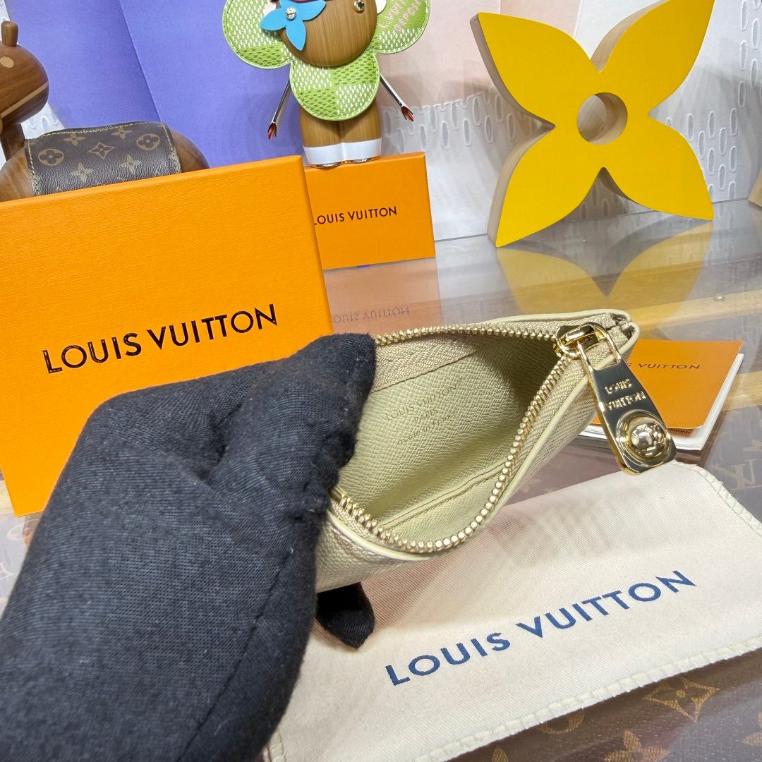 Louis Vuitton Leather Pouch with Gold Hardware