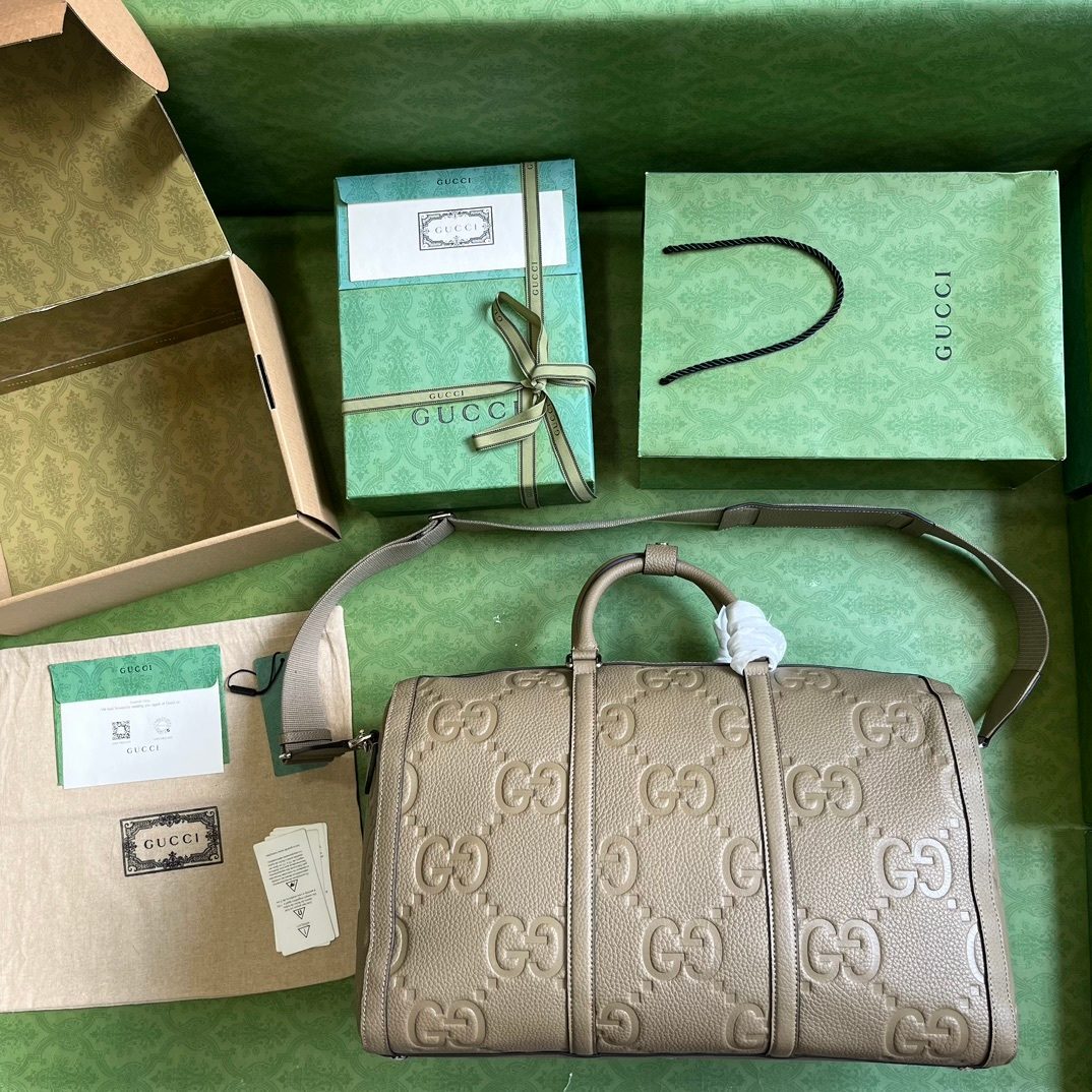 Gucci GG Embossed Leather Duffel Bag