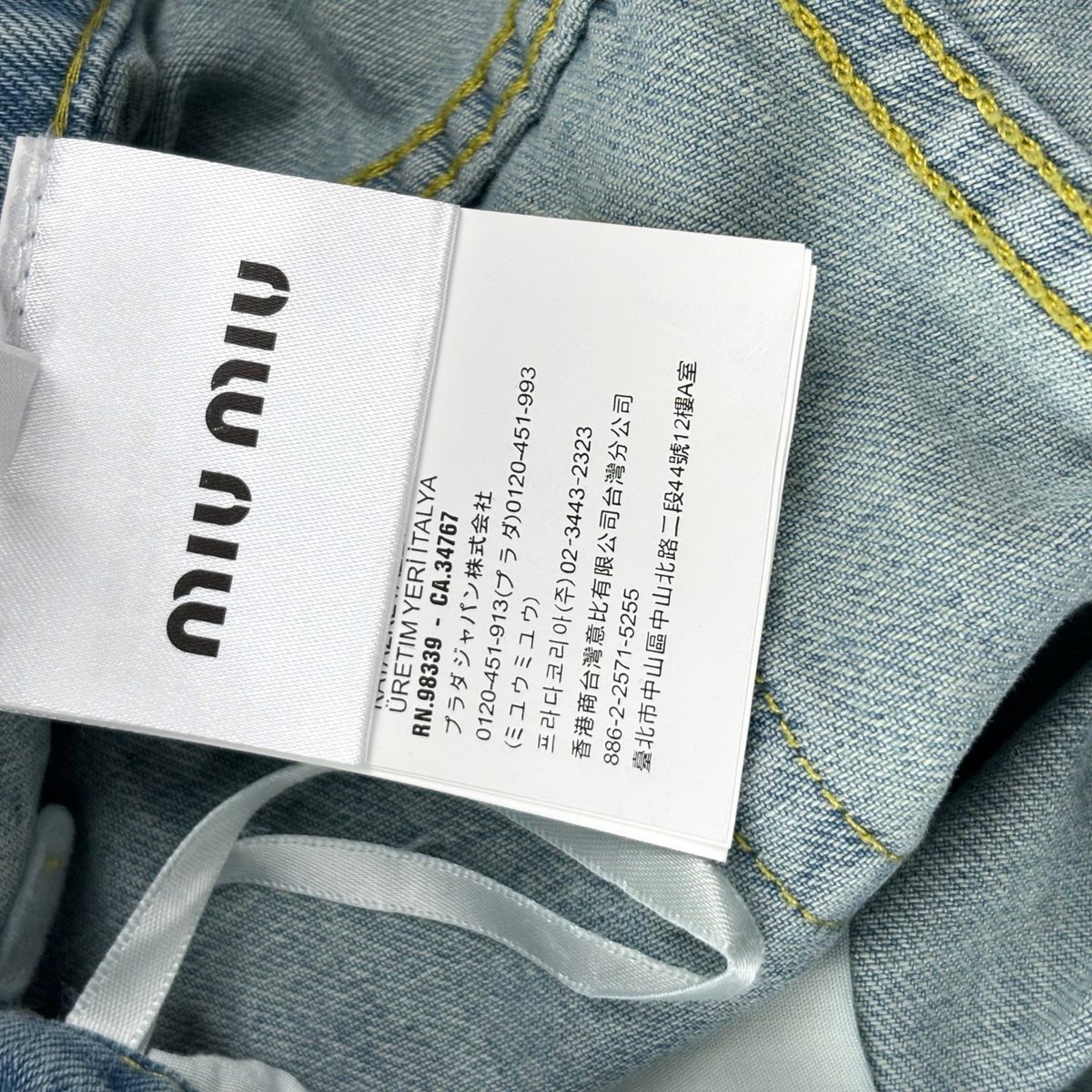 Miu Miu Embroidered Light Wash Denim Jeans