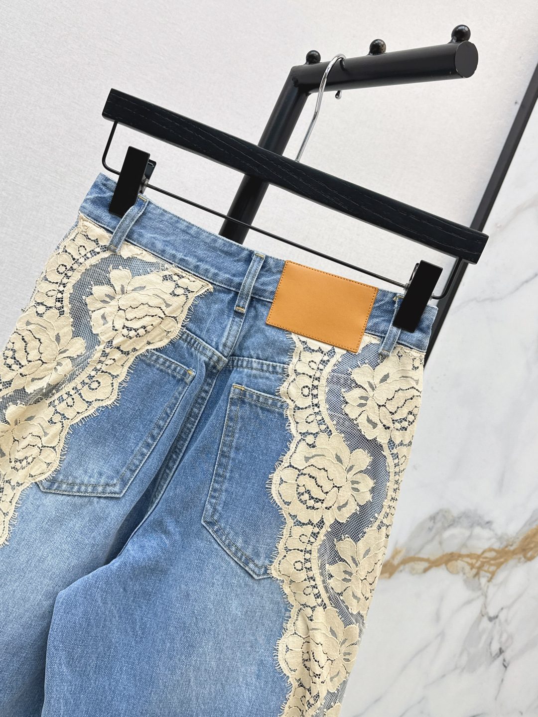 Lace-Trimmed Distressed Denim Jeans