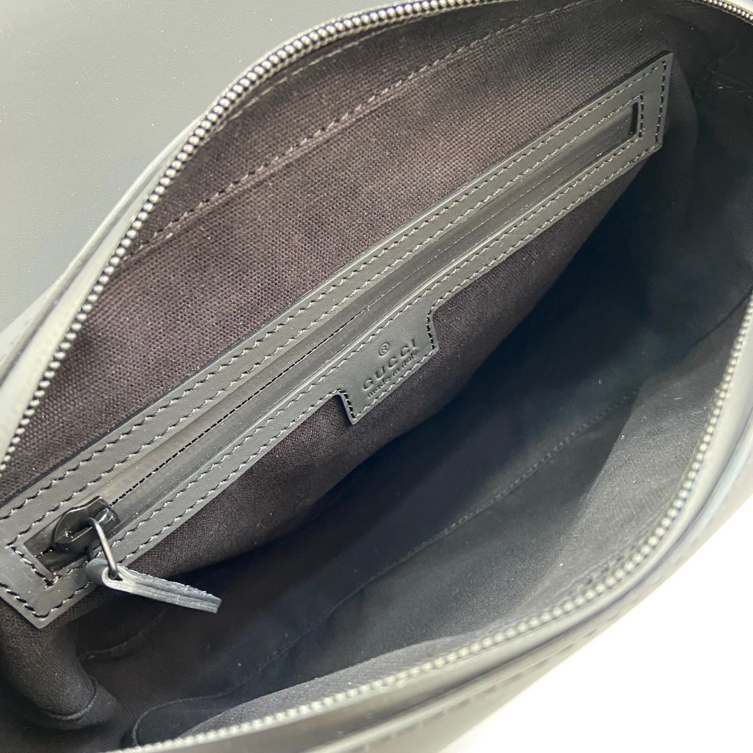 Gucci GG Embossed Leather Crossbody Bag