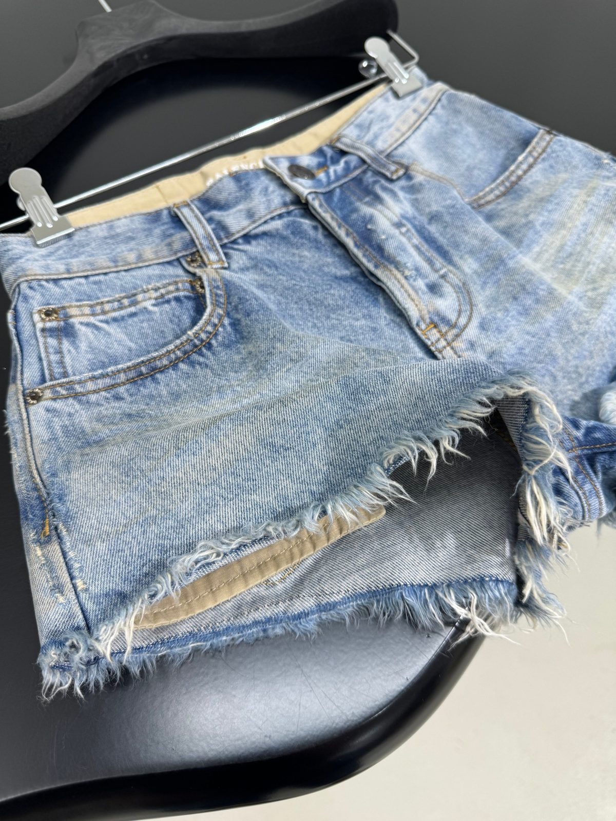 Balenciaga Light Wash Distressed Denim Shorts